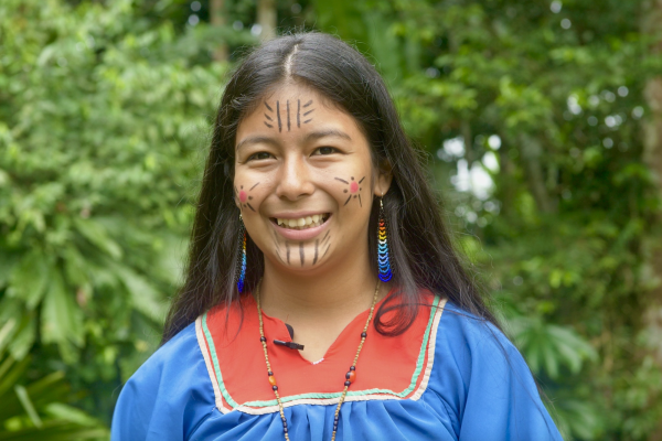 Wearing traditional clothing, Janeth Guanulema of the Indigenous group in the Amazon rainforest, called the Cofán, smiles for the camera. Sophomore Katia Thomas volunteers with the Cofán and said they are a resilient community that is working on land restoration. Thomas, along with other students and faculty, emphasized the importance of Indigenous Peoples’ Day and sharing the stories of Indigenous communities. Photo provided by Kumiko Hayashi.